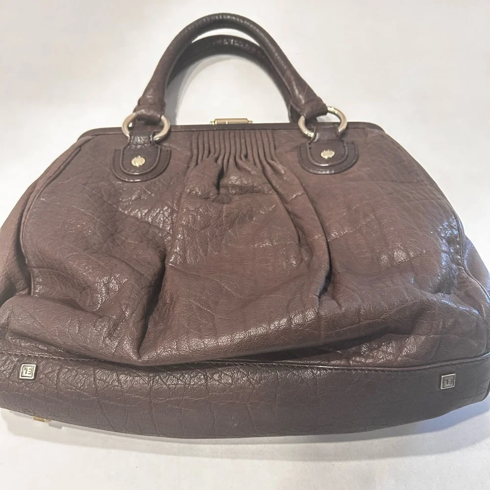Elliott Lucca excellent used